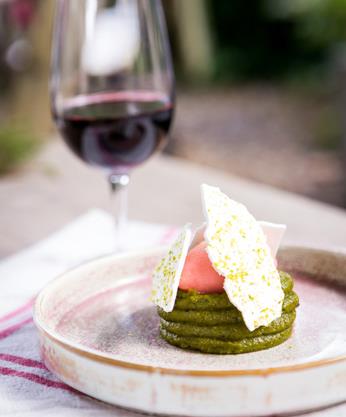 Poached Yorkshire rhubarb, pistachio curd & vanilla meringue