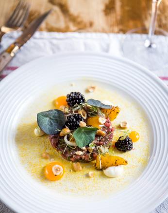 Venison tartare (Belton Park), bramble, orange, hazelnut, confit egg yolk, nasturtium